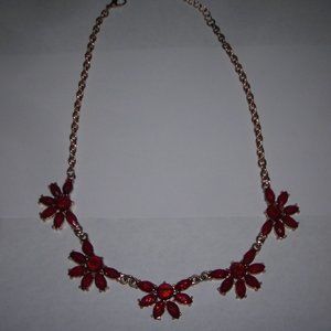 Necklace, red stones, gold tone finish